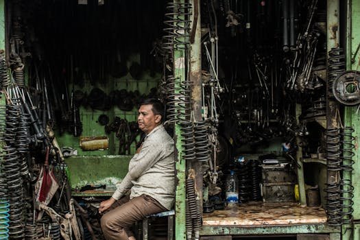 Man in a Small Metal Workshop 