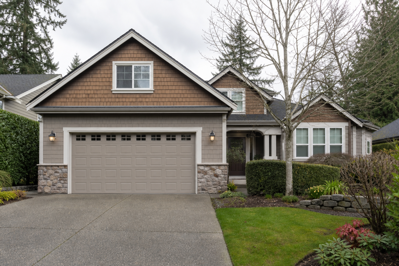Medina home exterior with a closed garage door on a quiet driveway
